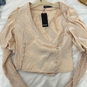 New with tags too from Nasty Gal